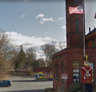 Figure 6 – Image of the Amazing Things Arts Center parcel, behind which a fence without an MWRA permit blocks bicyclists and pedestrians from traveling along the Sudbury Aqueduct.